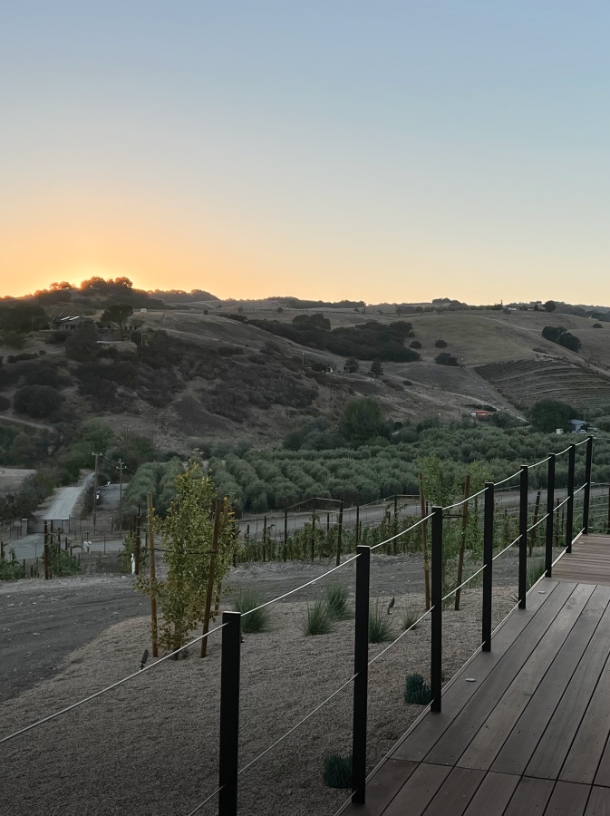 Sunset over rolling vineyard hills from the deck at 1200 Arbor